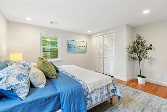 11 Williams St, Arlington, MA 02476 - bedroom with wood finished floors, recessed lighting, and a closet