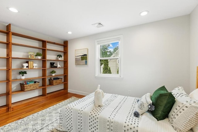 11 Williams St, Arlington, MA 02476 - bedroom with wood finished floors and recessed lighting