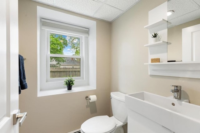 11 Williams St, Arlington, MA 02476 - half bath featuring toilet and a drop ceiling