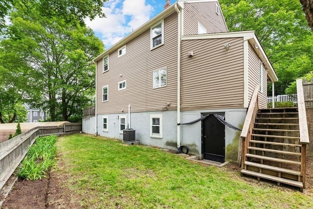 11 Williams St, Arlington, MA 02476 - rear view of property featuring a fenced backyard, stairway, and a deck