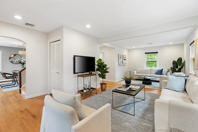 11 Williams St, Arlington, MA 02476 - living area with light wood-type flooring and recessed lighting