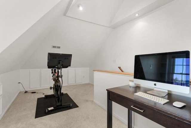 workout area with baseboards, visible vents, carpet floors, and lofted ceiling