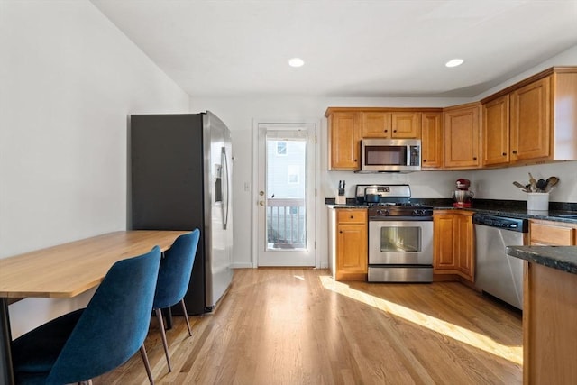 kitchen featuring recessed lighting, light wood-type flooring, and appliances with stainless steel finishes