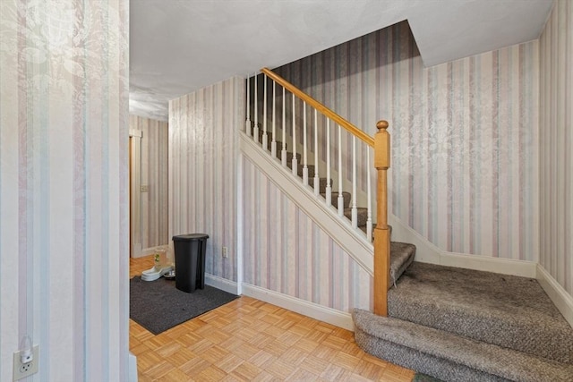 161 Old Farm Rd, Leominster, MA 01453 - stairway featuring wallpapered walls and baseboards