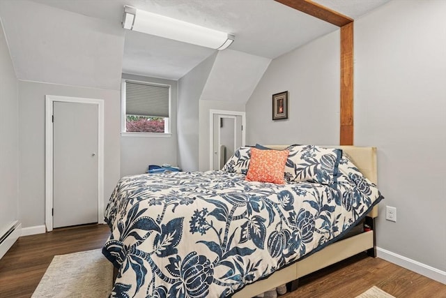161 Old Farm Rd, Leominster, MA 01453 - bedroom with wood finished floors, vaulted ceiling, baseboards, and baseboard heating