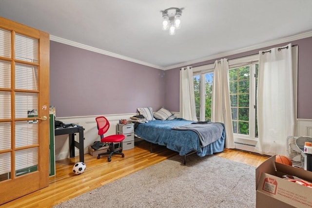 161 Old Farm Rd, Leominster, MA 01453 - bedroom with crown molding, wood finished floors, and a wainscoted wall