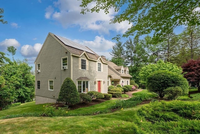 161 Old Farm Rd, Leominster, MA 01453 - view of front of property with a front yard and solar panels