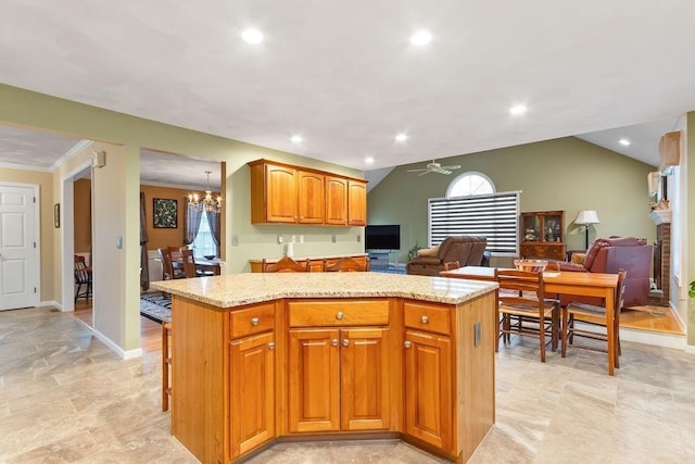 19 Miele Rd, Marlborough, MA 01752 - kitchen with a kitchen island, open floor plan, a fireplace, a ceiling fan, and recessed lighting