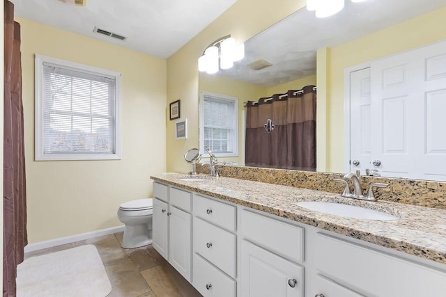 19 Miele Rd, Marlborough, MA 01752 - full bath with baseboards, toilet, double vanity, a shower with curtain, and tile patterned flooring