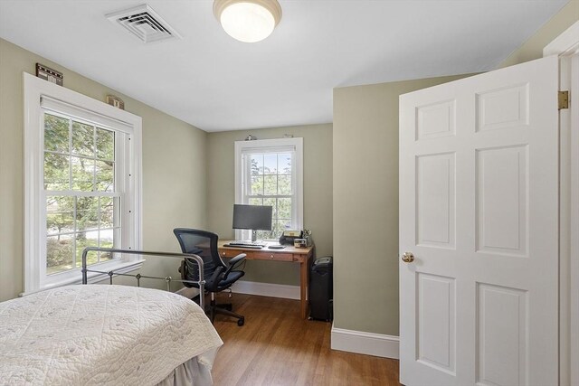 79 Cheever Cir, Andover, MA 01810 - bedroom with wood finished floors, baseboards, and a desk