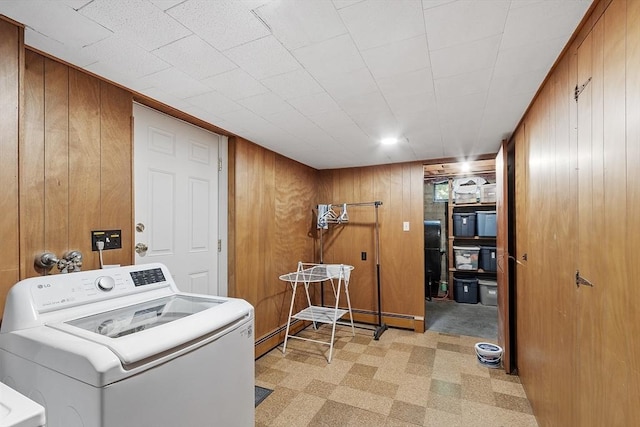 79 Cheever Cir, Andover, MA 01810 - laundry area with washer / dryer, wood walls, and light flooring