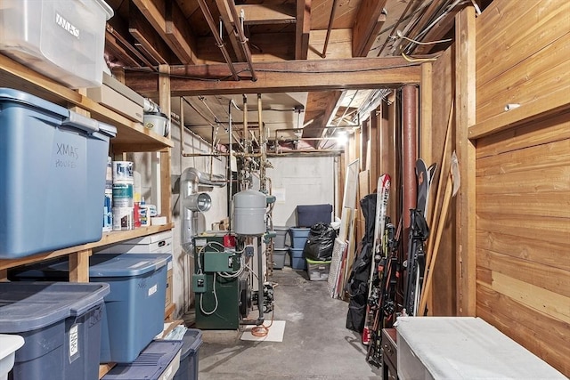 79 Cheever Cir, Andover, MA 01810 - unfinished below grade area with a heating unit and wooden walls