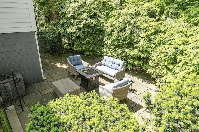 79 Cheever Cir, Andover, MA 01810 - view of patio / terrace with an outdoor living space with a fire pit