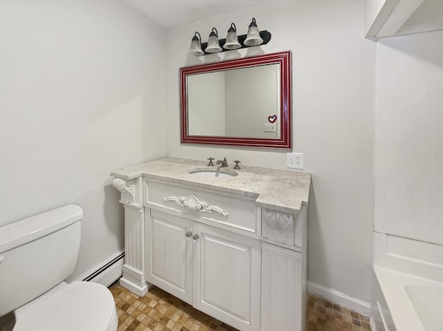 full bath featuring a washtub, a baseboard radiator, toilet, vanity, and baseboards