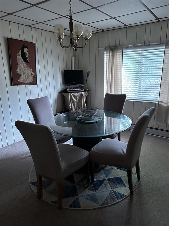 9 Coburn Ave, Worcester, MA 01604 - dining room with a chandelier, carpet, and a paneled ceiling