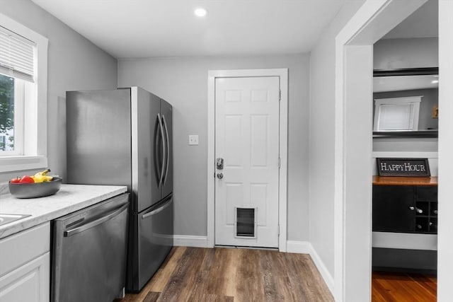 39-41 Ryan St, New Bedford, MA 02740 - kitchen featuring dishwasher, dark wood-type flooring, white cabinets, and recessed lighting