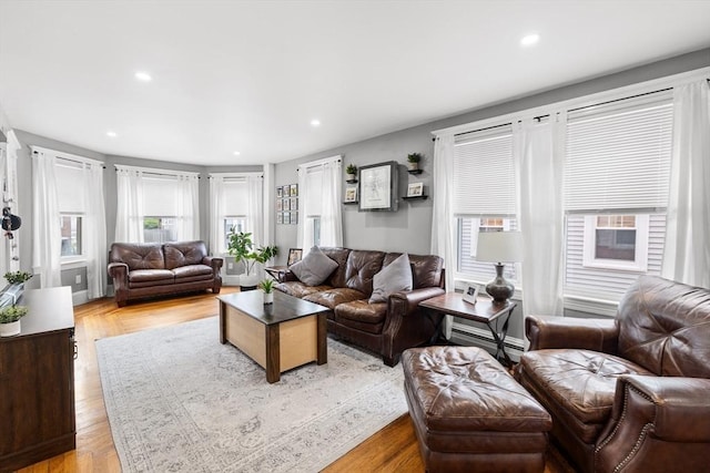 39-41 Ryan St, New Bedford, MA 02740 - living area featuring recessed lighting and a baseboard radiator