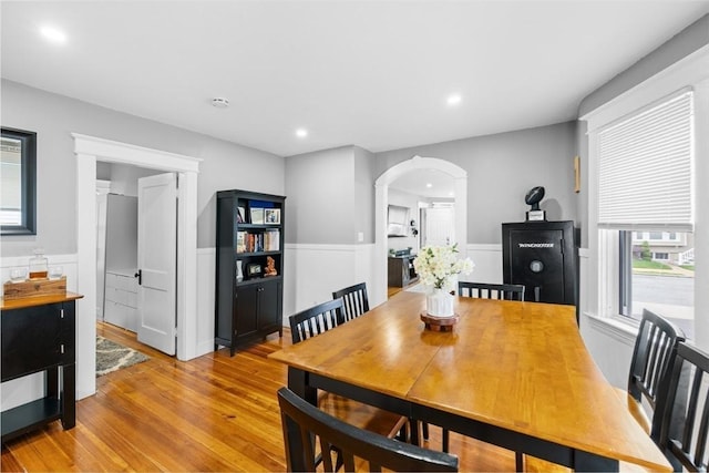 39-41 Ryan St, New Bedford, MA 02740 - dining room with light wood-style floors, arched walkways, wainscoting, and recessed lighting