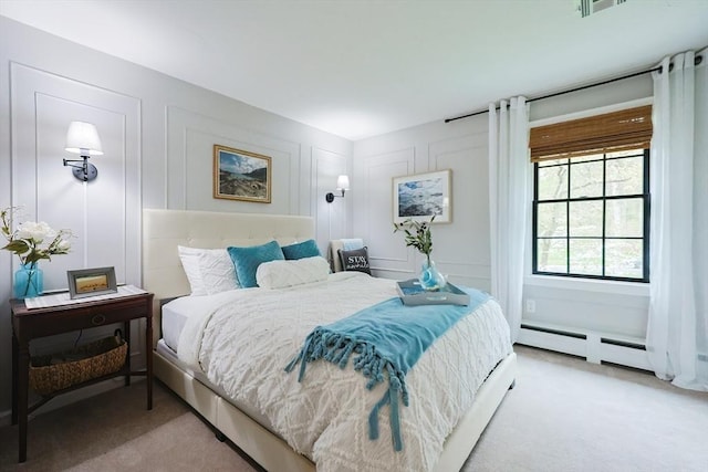 13 Bogastow Cir, Millis, MA 02054 - bedroom with light colored carpet and a decorative wall