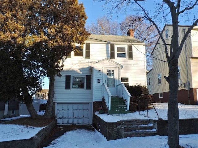 view of front of home with a garage