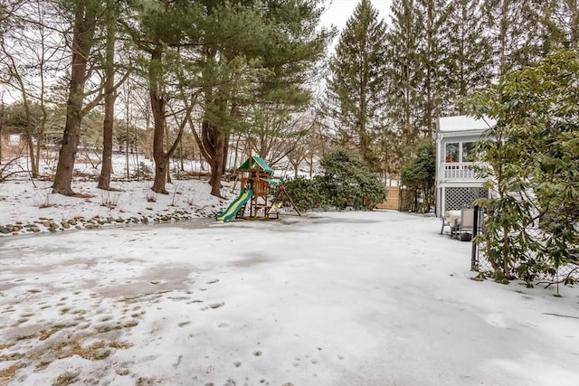 snow covered playground featuring playground community