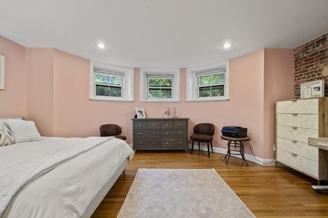17 Gloucester St Unit A, Boston, MA 02115 - bedroom with wood finished floors, multiple windows, and recessed lighting