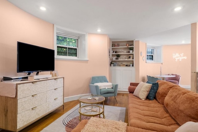 17 Gloucester St Unit A, Boston, MA 02115 - living area with wood finished floors, plenty of natural light, and recessed lighting