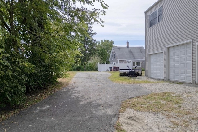 exterior space with a garage