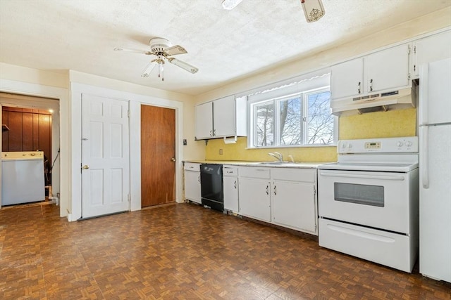 kitchen featuring white appliances, washer / clothes dryer, light countertops, under cabinet range hood, and white cabinetry