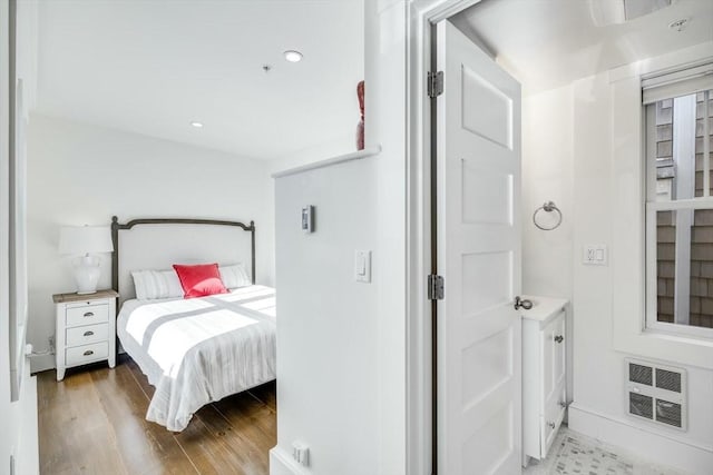 bedroom featuring light hardwood / wood-style floors