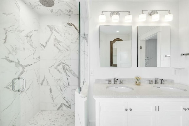 bathroom with vanity and an enclosed shower