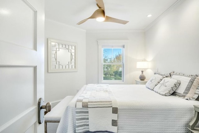 bedroom with ceiling fan and ornamental molding