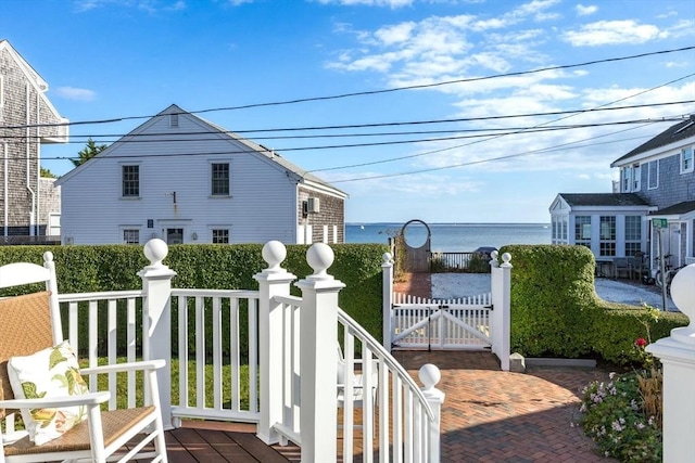 view of home's exterior featuring a water view