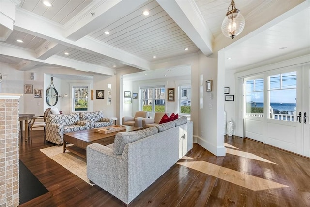 living room with beam ceiling, a water view, wooden ceiling, and dark wood-type flooring