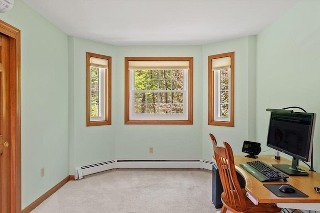 office with light carpet, a baseboard radiator, and baseboards