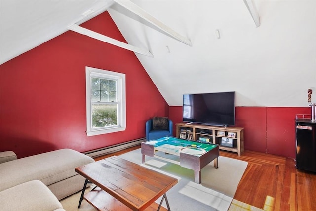 living area featuring baseboard heating, wood finished floors, and vaulted ceiling