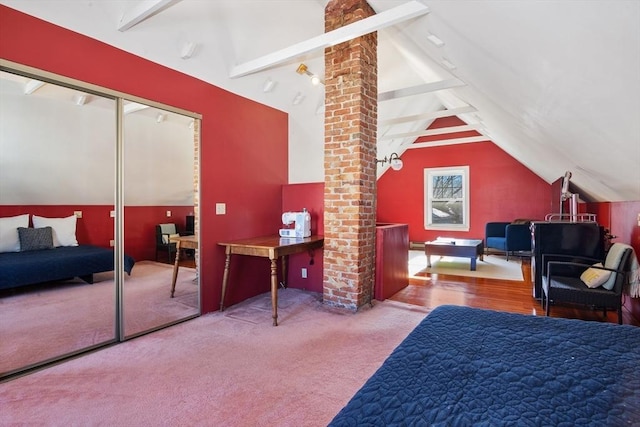 bedroom with carpet and a closet