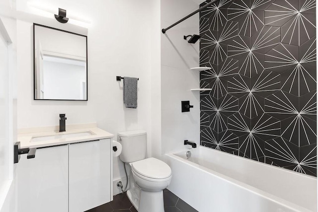 full bath with vanity, tile patterned floors, toilet, and shower / tub combination