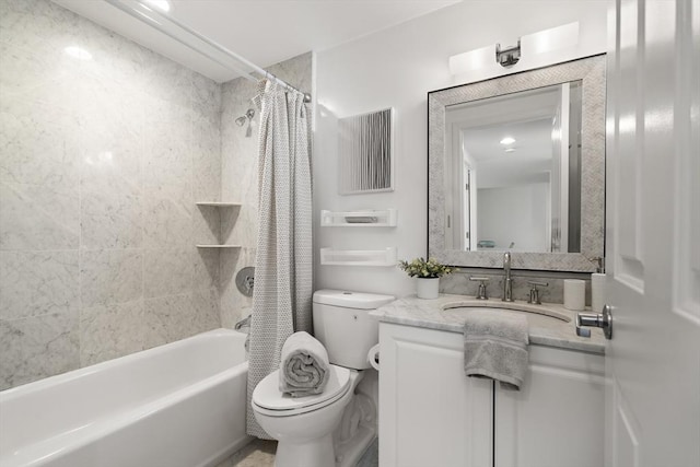 bathroom with toilet, shower / tub combo, and vanity