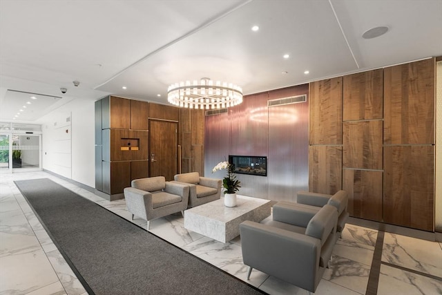 lobby with recessed lighting and wooden walls