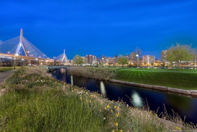 surrounding community with a water view