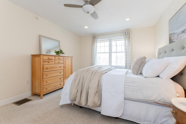 bedroom featuring a ceiling fan, baseboards, visible vents, recessed lighting, and light carpet