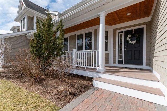 doorway to property with covered porch