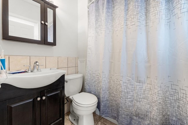 843 Stafford Rd, Fall River, MA 02721 - bathroom featuring vanity, tile walls, tile patterned floors, wainscoting, and a shower with curtain