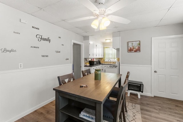 843 Stafford Rd, Fall River, MA 02721 - dining space with a paneled ceiling, wood finished floors, and a ceiling fan
