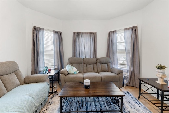 843 Stafford Rd, Fall River, MA 02721 - living area with healthy amount of natural light and light wood finished floors