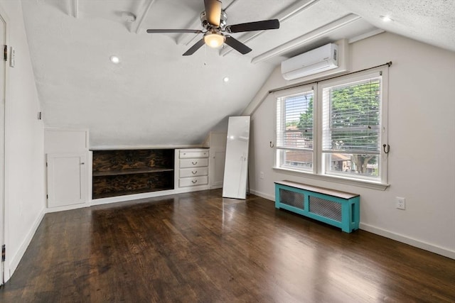 5 Ethel St, Blackstone, MA 01504 - bonus room with radiator heating unit, a wall mounted air conditioner, wood finished floors, lofted ceiling, and baseboards