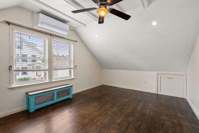 5 Ethel St, Blackstone, MA 01504 - additional living space with radiator, wood finished floors, a wall mounted AC, vaulted ceiling, and baseboards