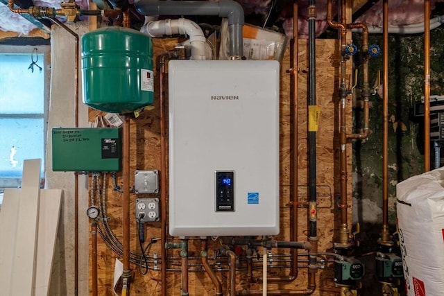 5 Ethel St, Blackstone, MA 01504 - utility room featuring tankless water heater