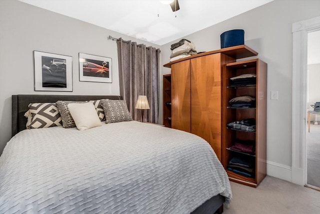 bedroom featuring carpet flooring and ceiling fan